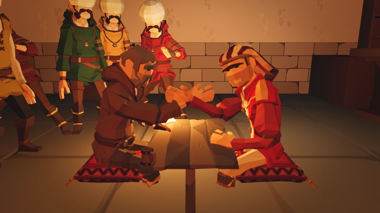 Kalabalığın gözü masada; bilek güreşi yandan.